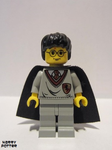 lego 2001 mini figurine hp005 Harry Potter Gryffindor Shield Torso, Light Gray Legs, Black Cape with Stars 