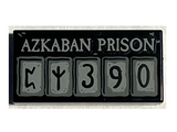 Black Tile 1 x 2 with Groove with Light Bluish Gray 'AZKABAN PRISON' and Squares with Runes and '390' Pattern