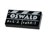 Black Tile 1 x 2 with Groove with Film Slate with White 'OSWALD' and 'act:2 take:1' Pattern